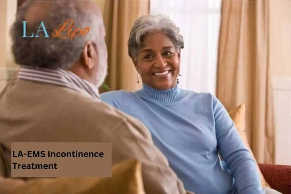 Couple sat smiling at each other - LA-EMS treatment Bedfordshire