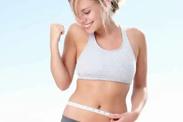 woman happy after fat reduction treatment Bedfordshire