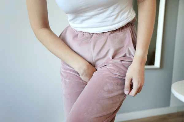 woman struggling with urine incontinence Bedfordshire
